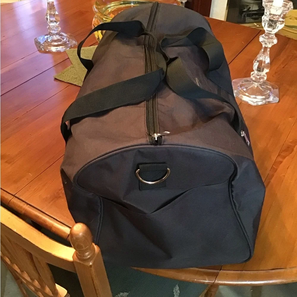 NWOT Prestige Travel Duffle Bag in Black.